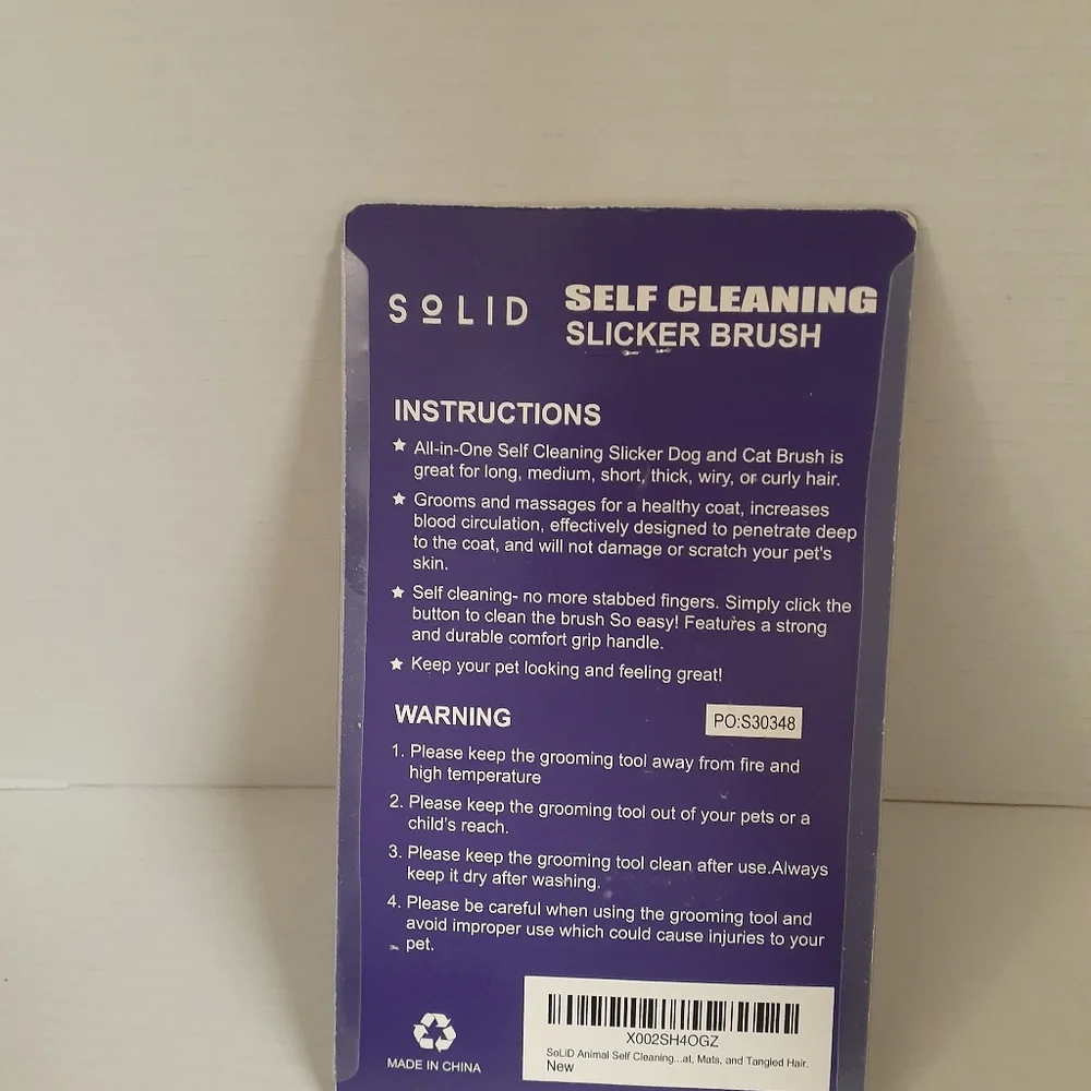 NWT in package Solid Self Cleaning Slicker Pet Brush in Purple for Dogs and Cats